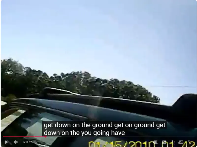 Stepped frame by frame, it shows Weinhaus's left wrist … the camera was a watch on that wrist … raised above the roof of his car while an officer shouts at him to get on the ground. Frame from Jeffrey Weinhaus’s watch camera showing his left wrist raised above the roof of his vehicle moments before the shooting, while an officer orders him to get on the ground.